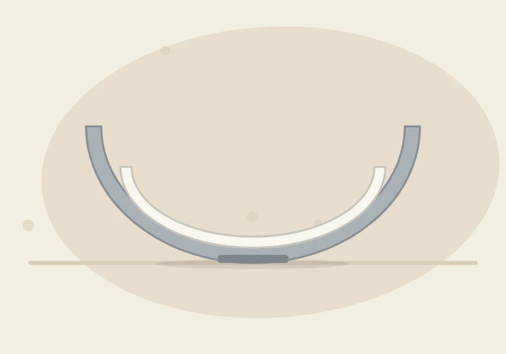 Side view cross-section of a clay circle resting inside a kitchen bowl so it dries into a curved dish shape